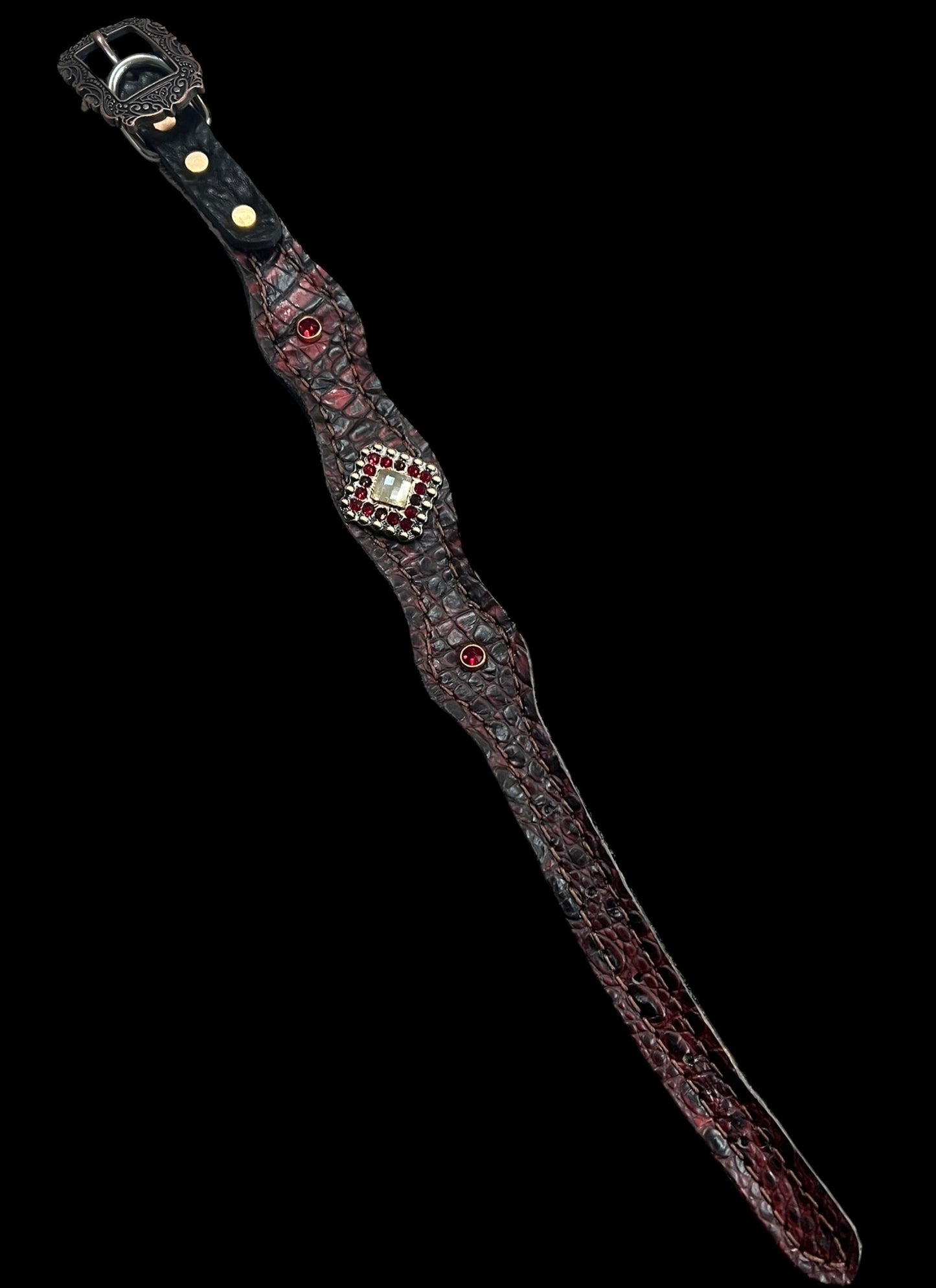 Dark red gator on dark leather