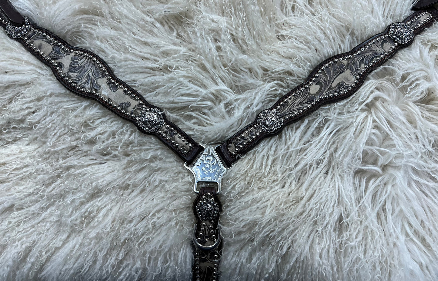 Stone floral on dark leather