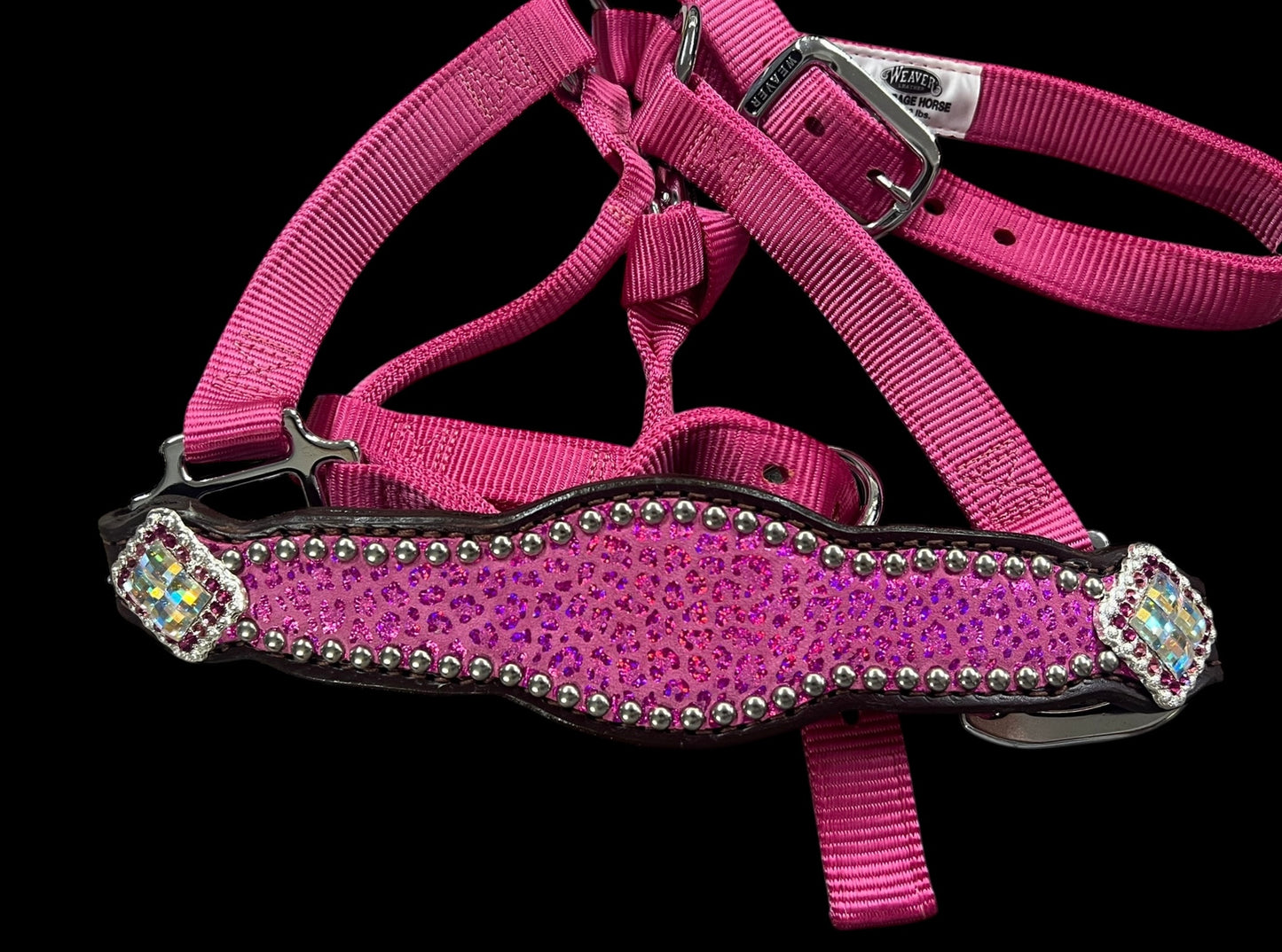 Pink leopard on dark leather