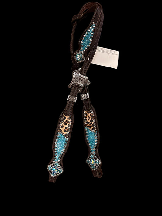 Turquoise sparkle and leopard on dark leather