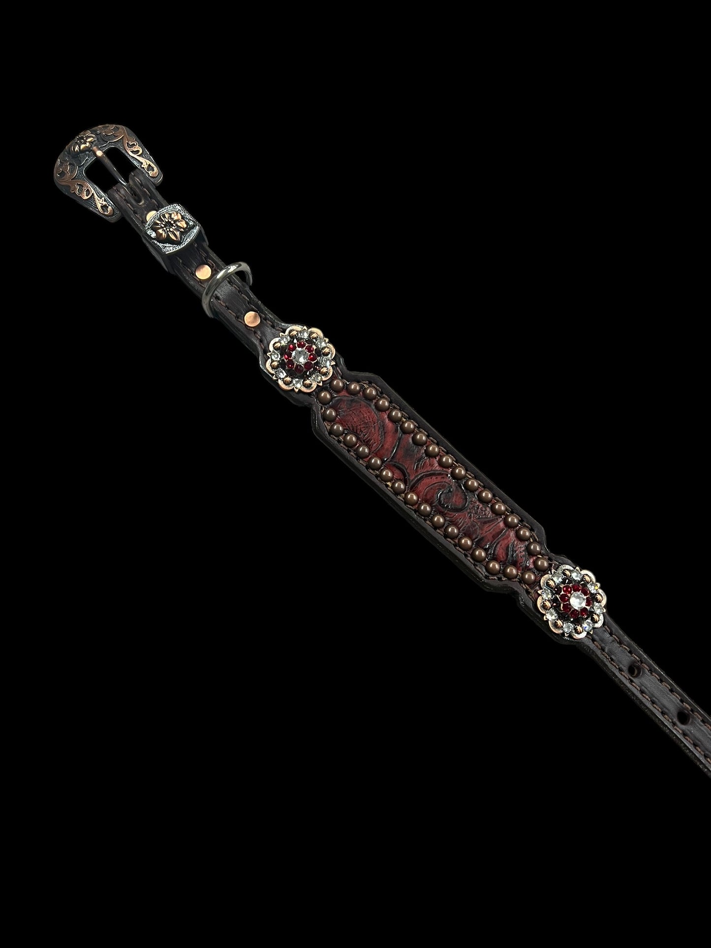 Red roses on dark leather