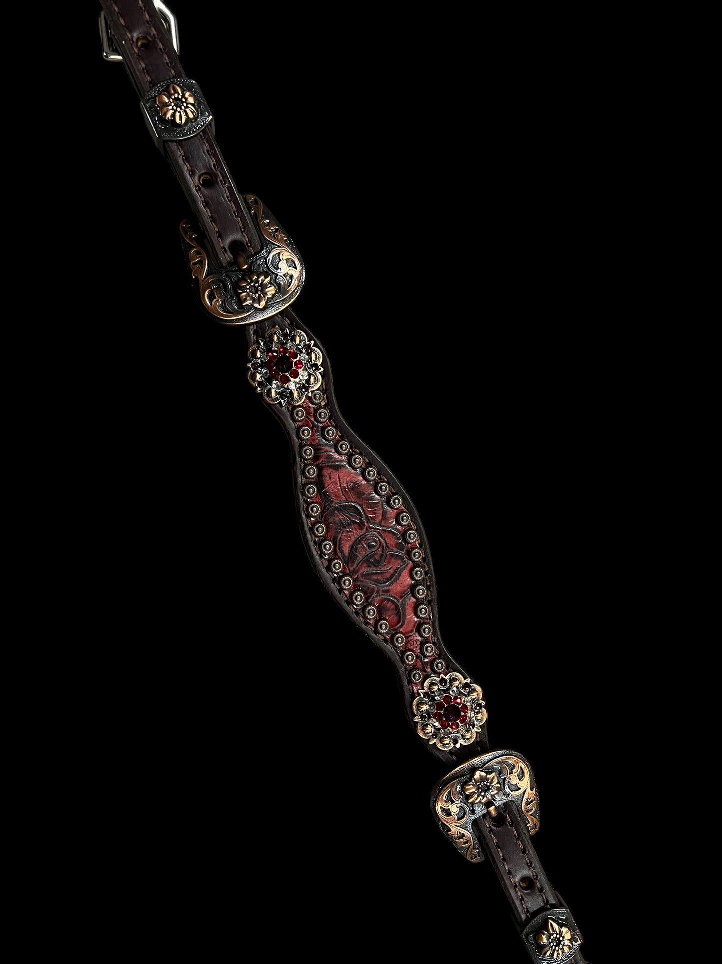 Red roses on dark leather