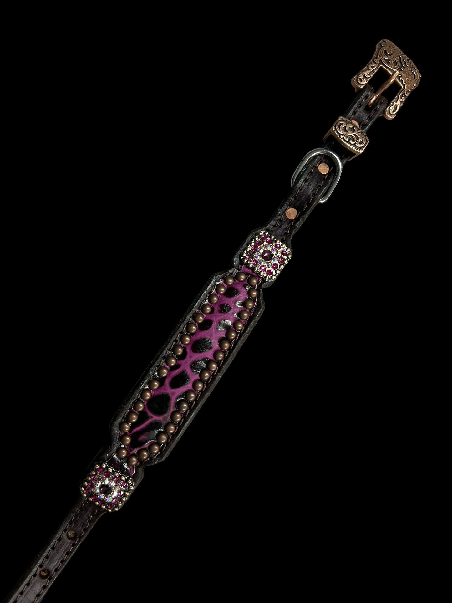 Fuchsia gator on dark leather