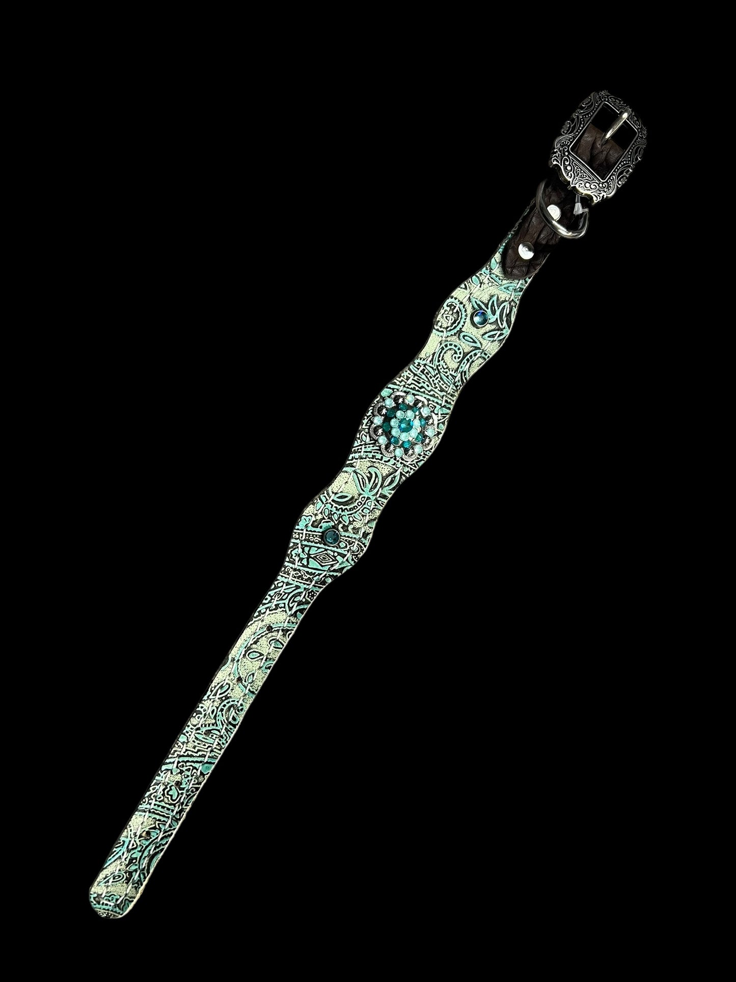 Turquoise and mint paisley on dark leather is