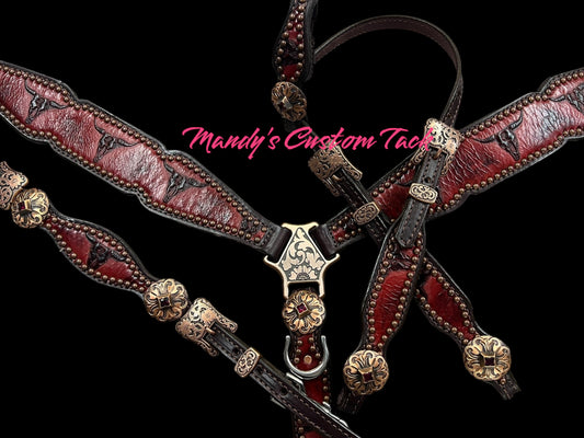 Red longhorns on dark leather