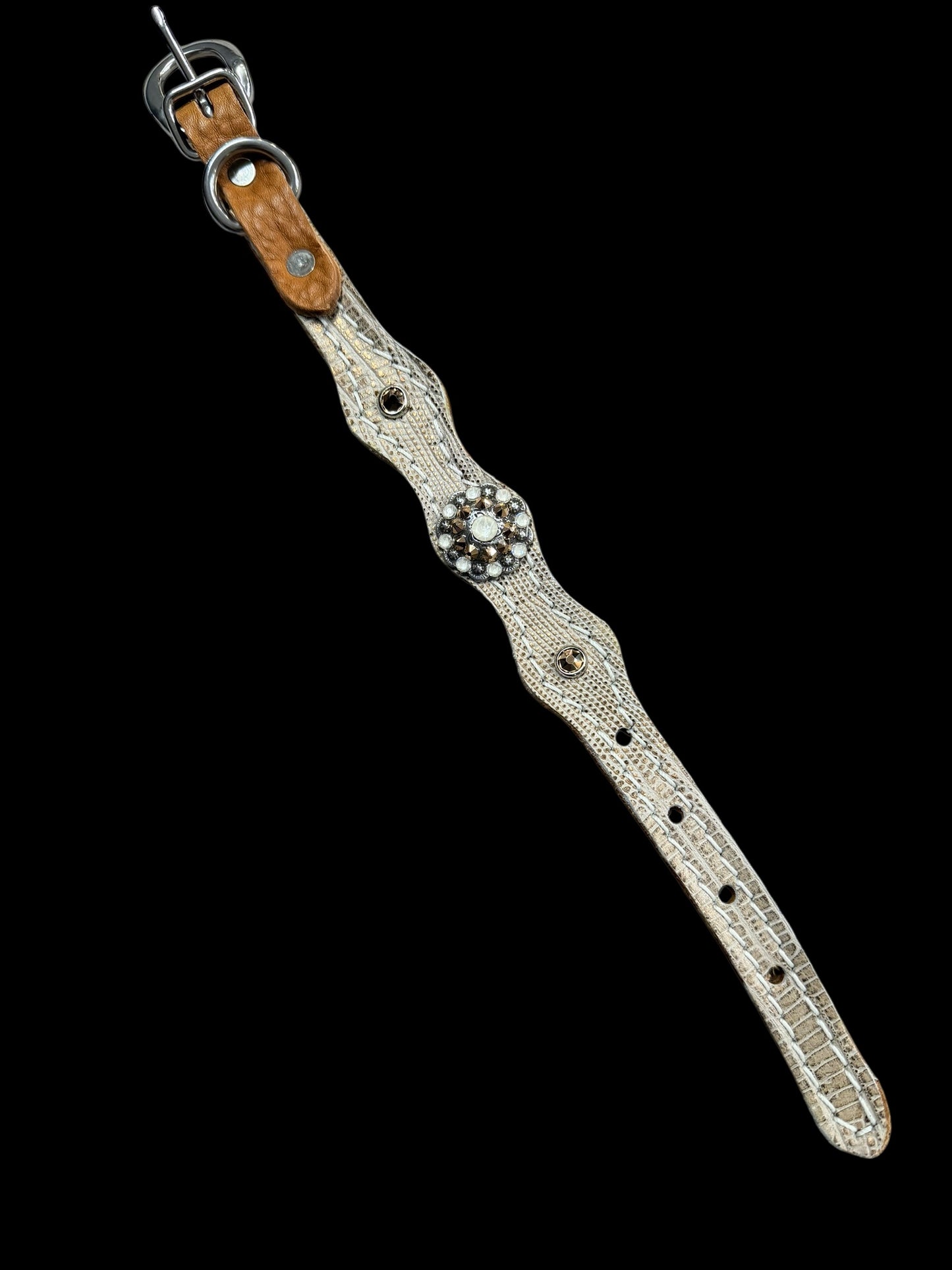 copper lizard on dark leather