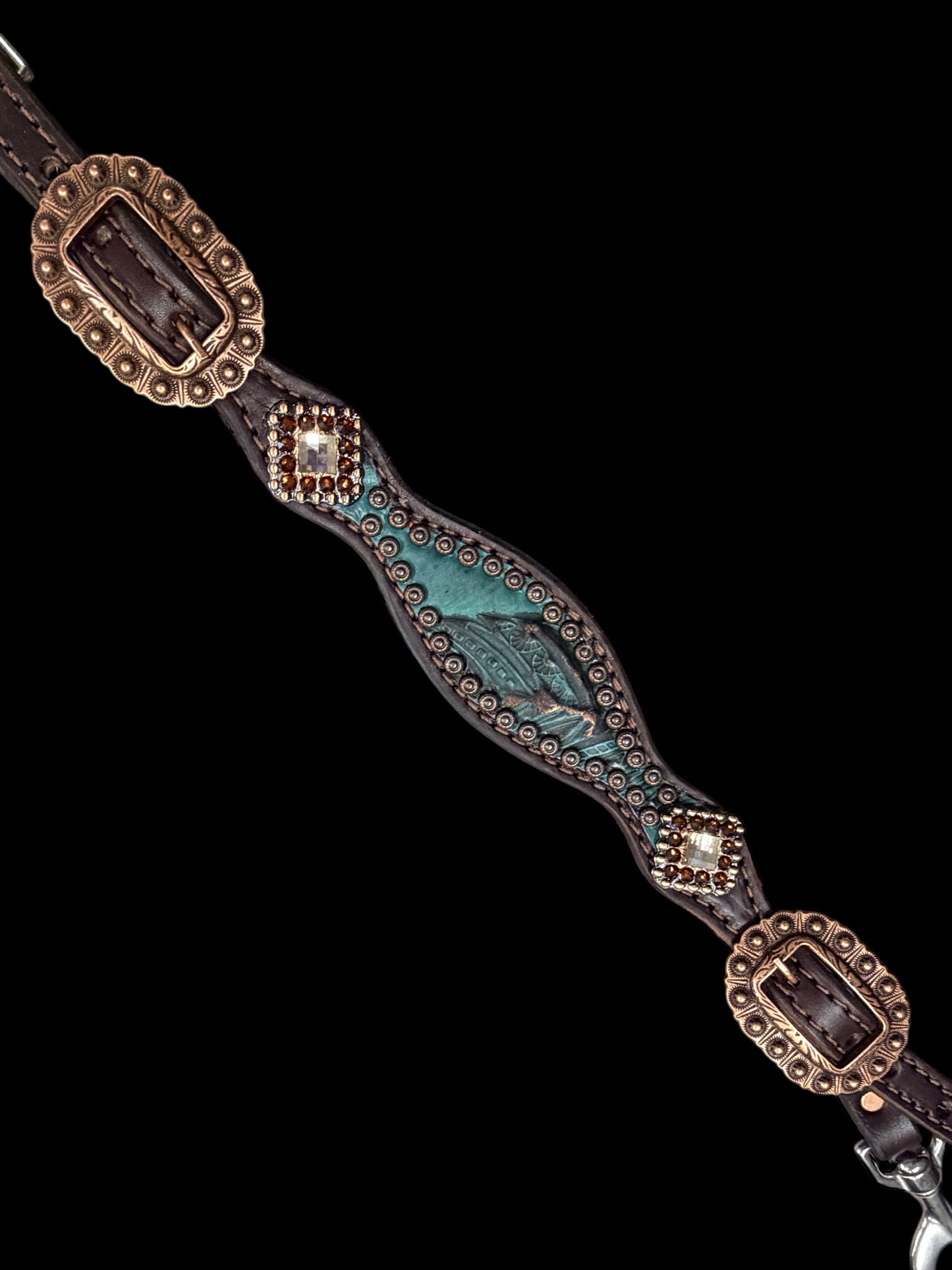 jade feathers on dark leather