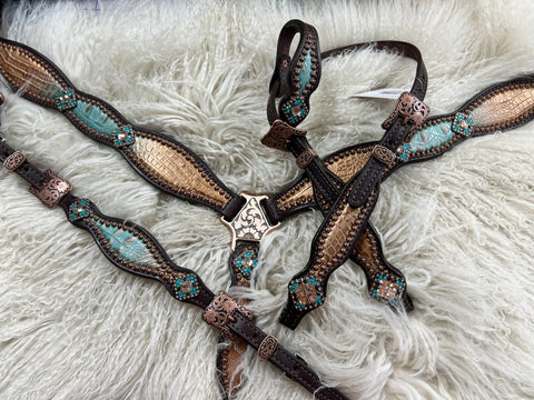Brown and teal gator on dark leather