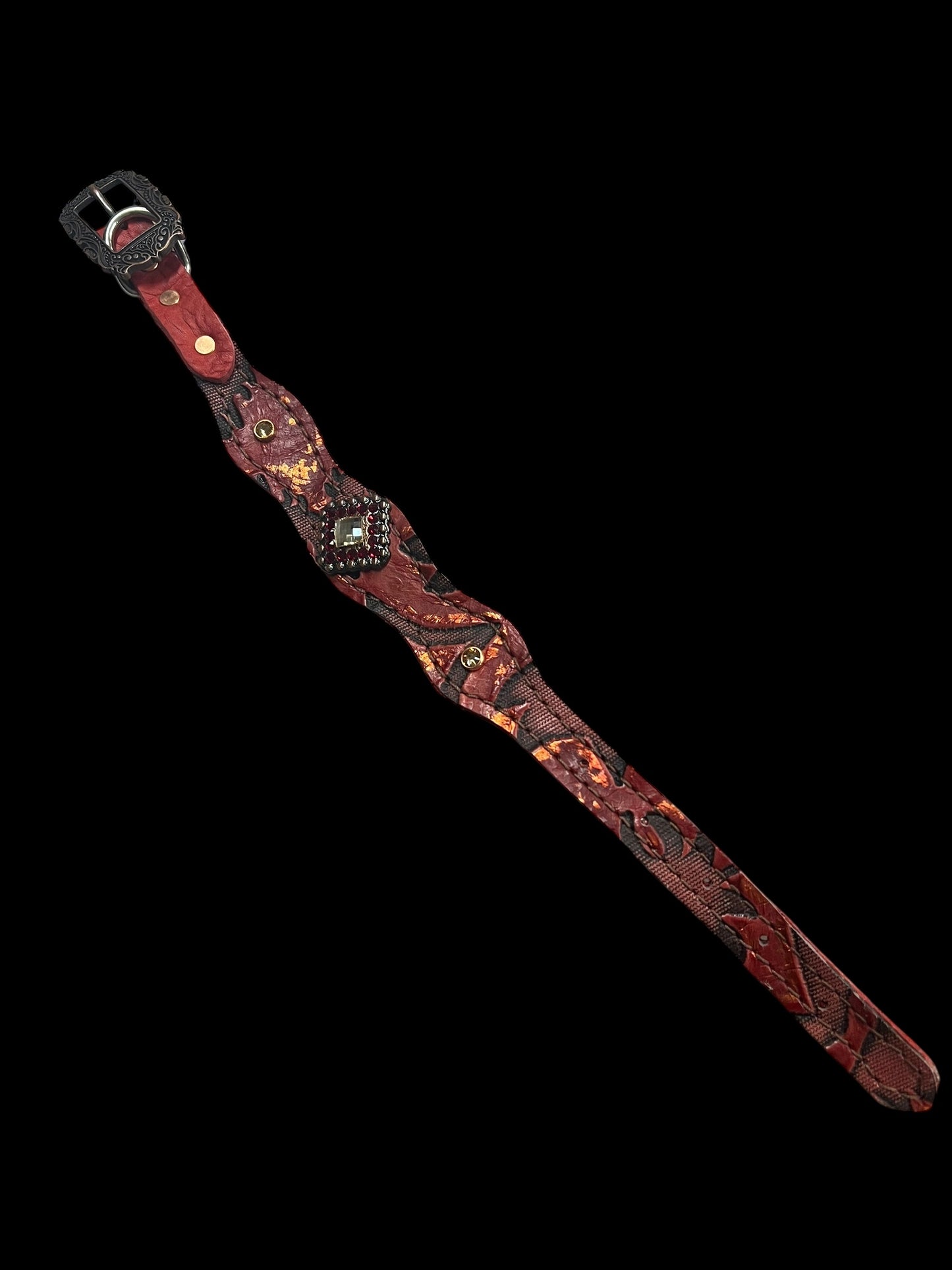 Red and copper Laredo on dark leather