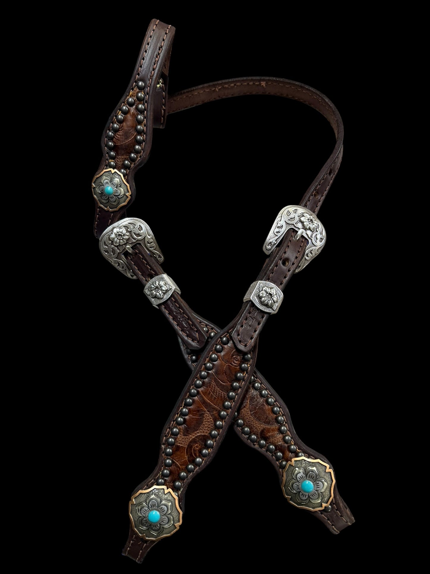 Brown floral on dark leather