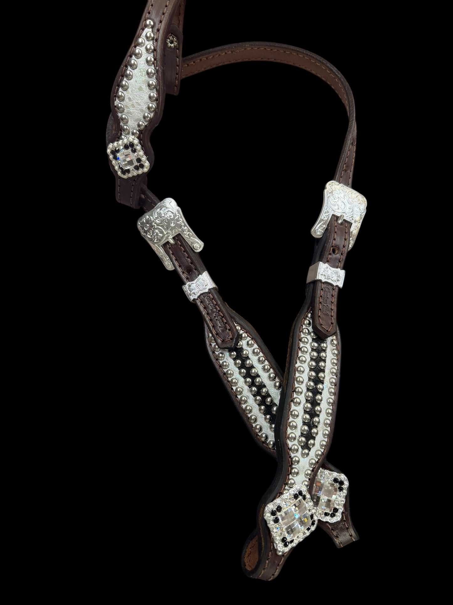 Black and white mystic on dark leather