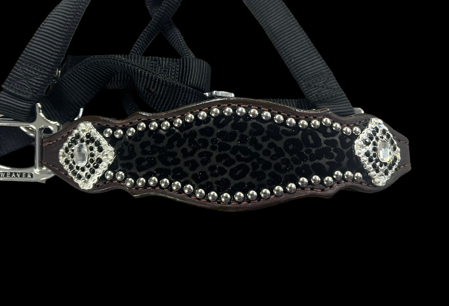 Black flocked leopard on dark leather