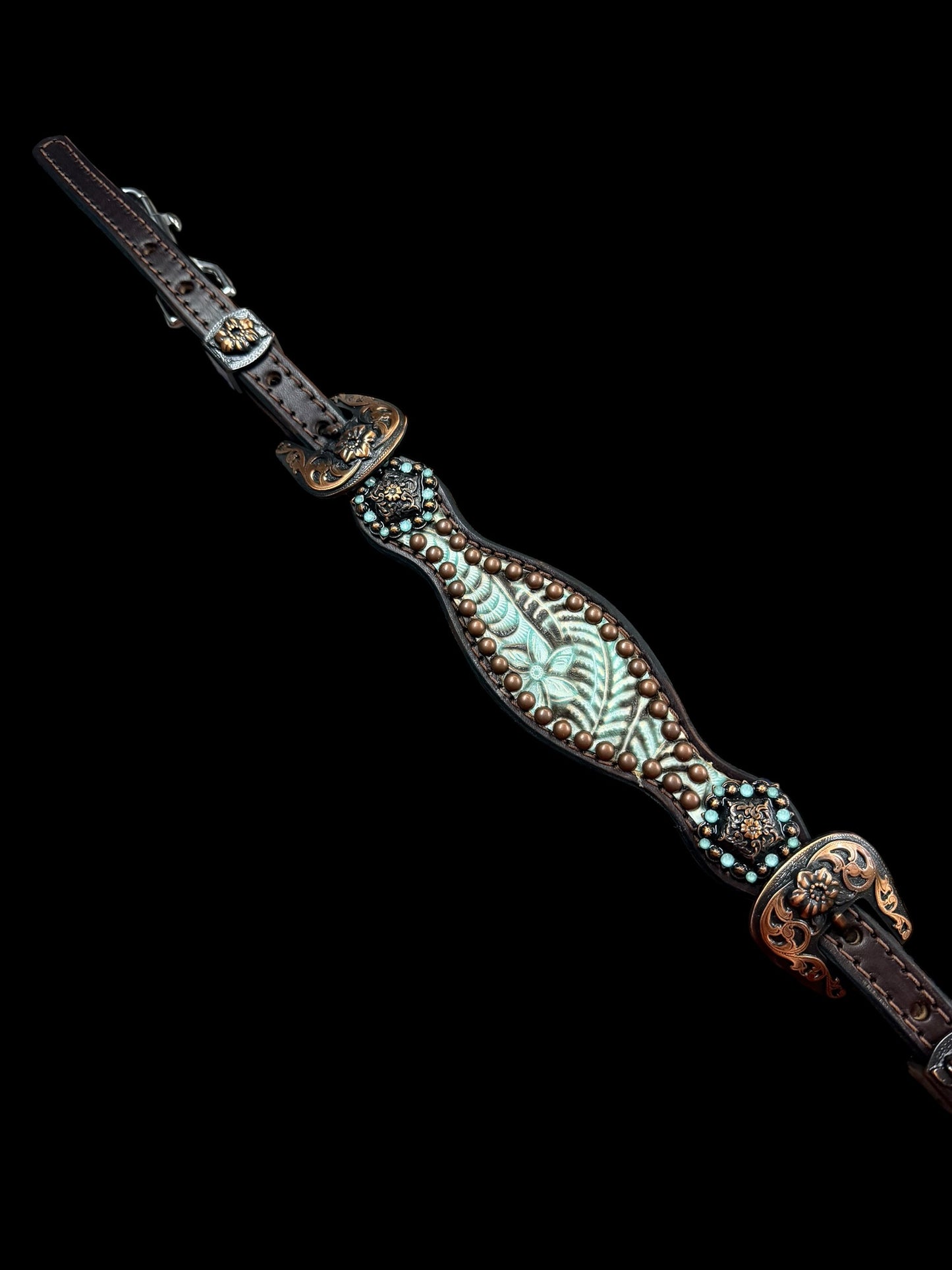 Brown and mint floral on dark leather
