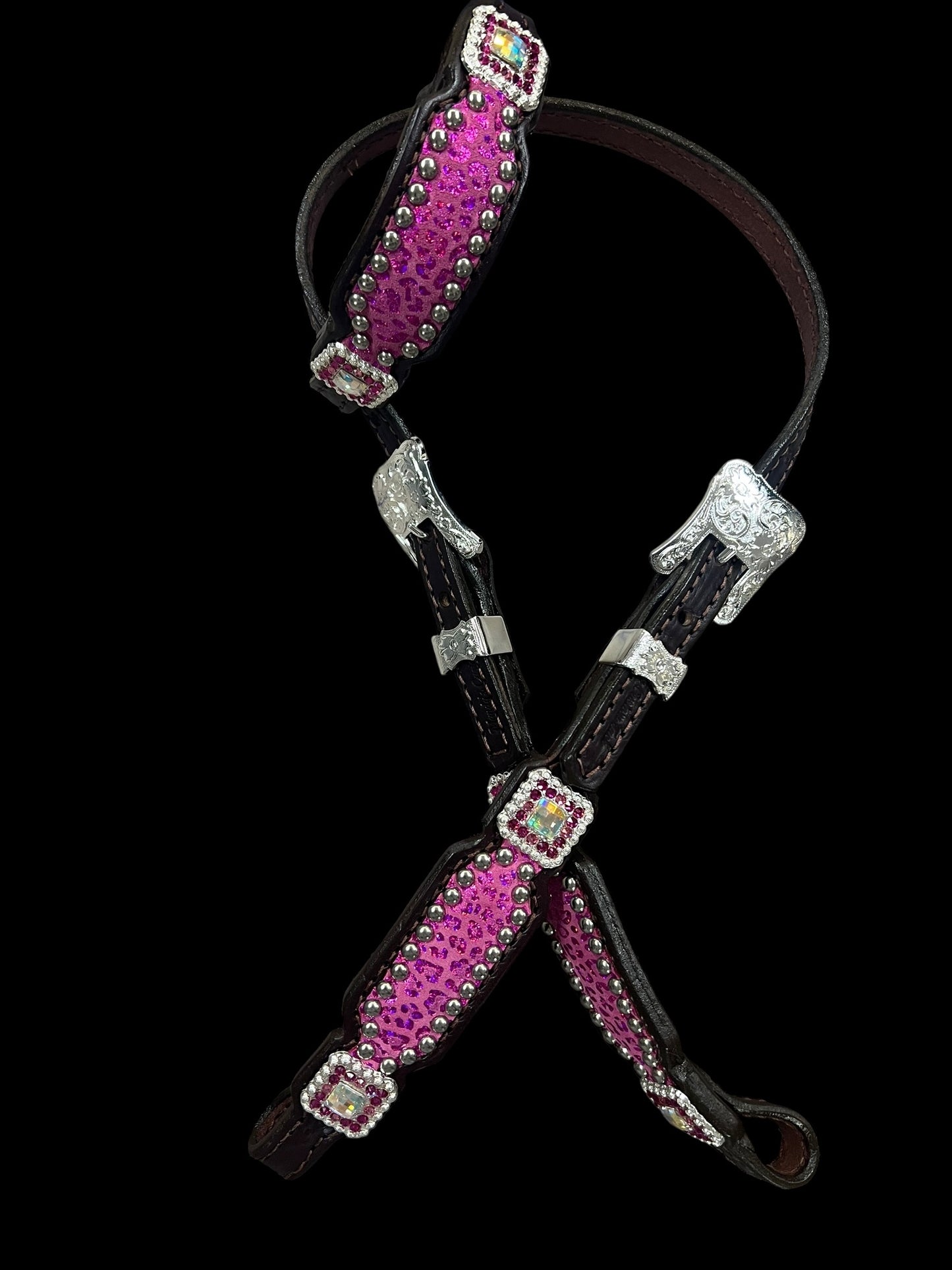 Pink leopard on dark leather