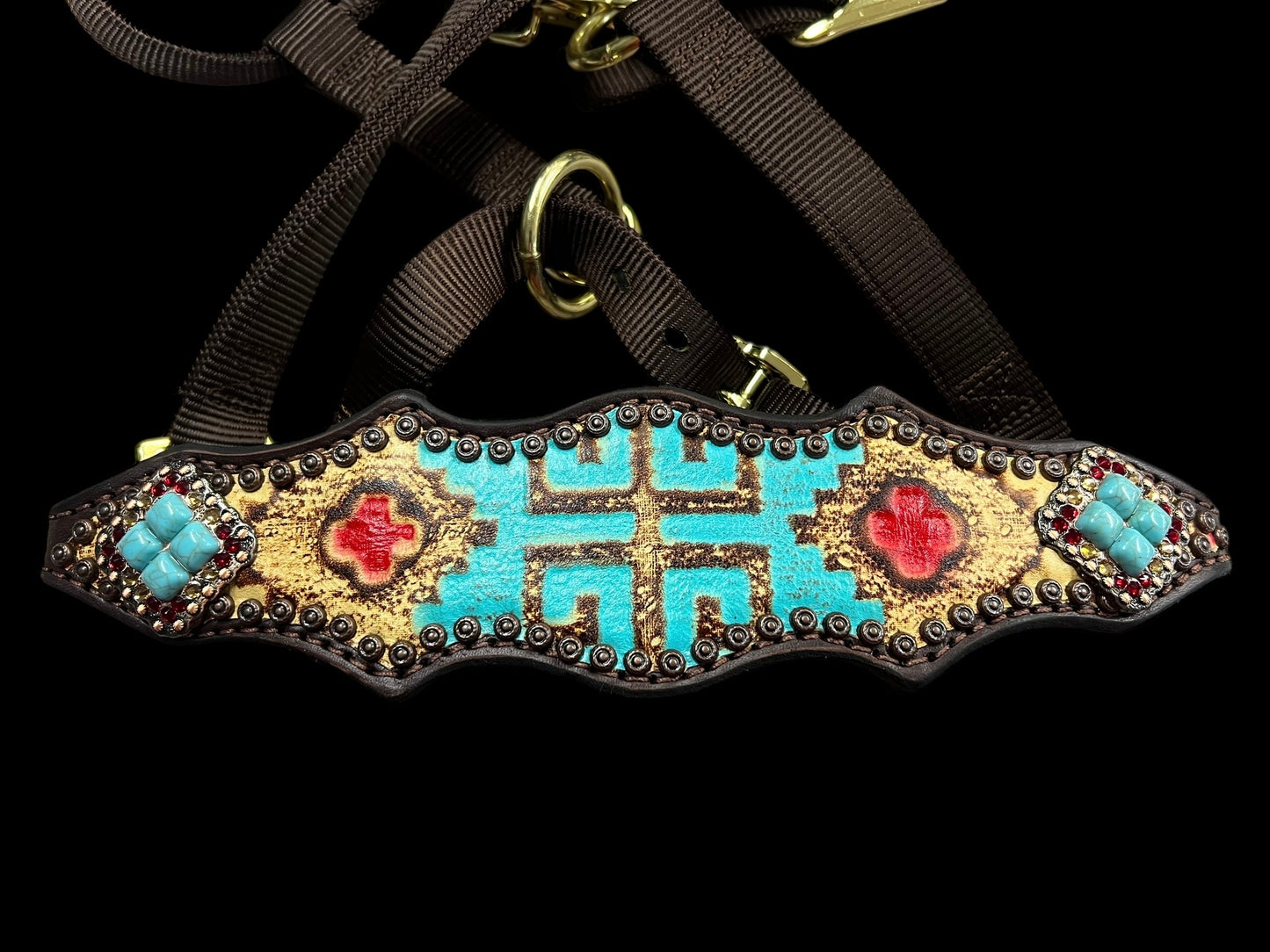 Tan, red, and turquoise Taos on dark leather