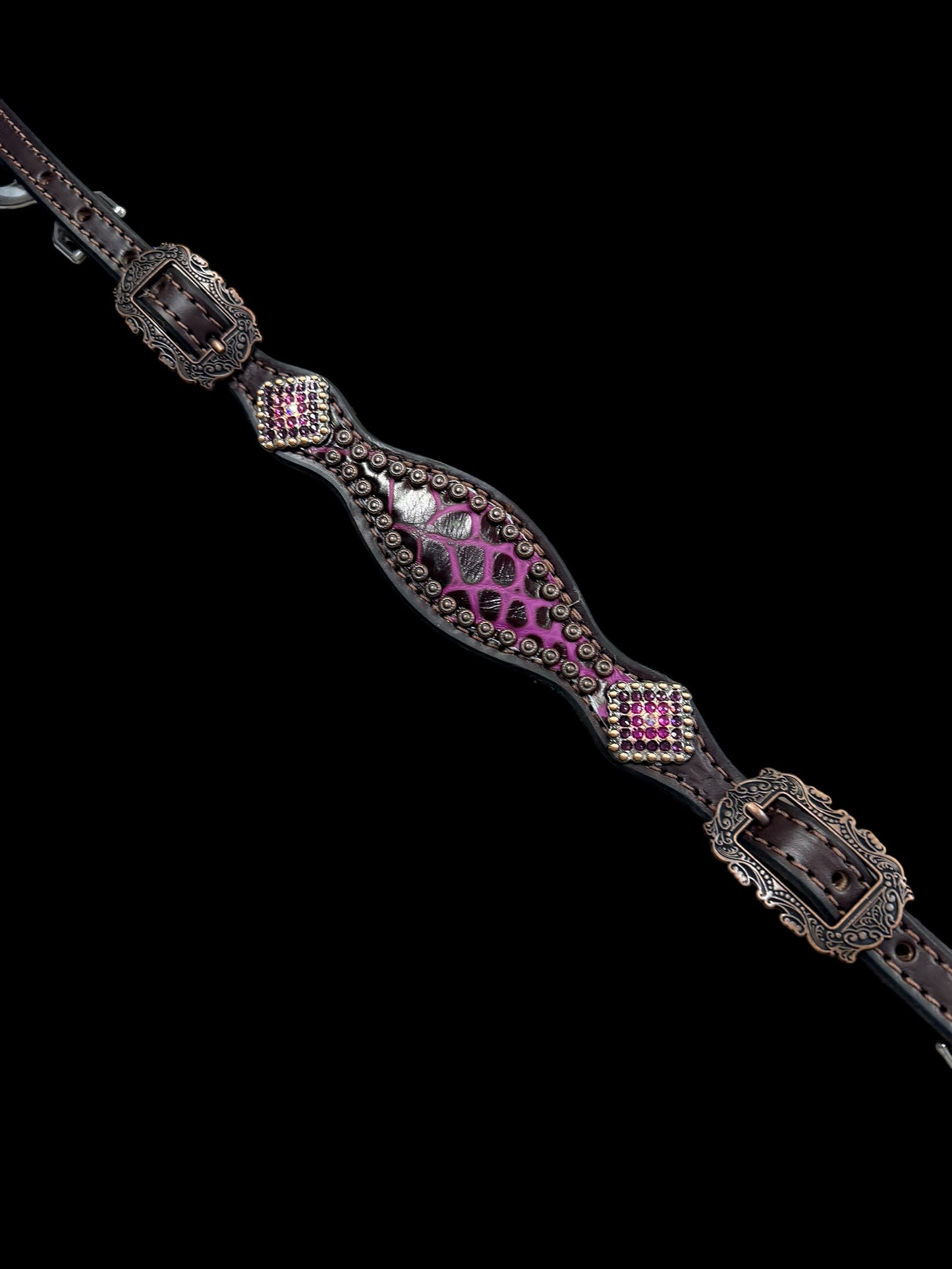 Fuchsia  gator on dark leather