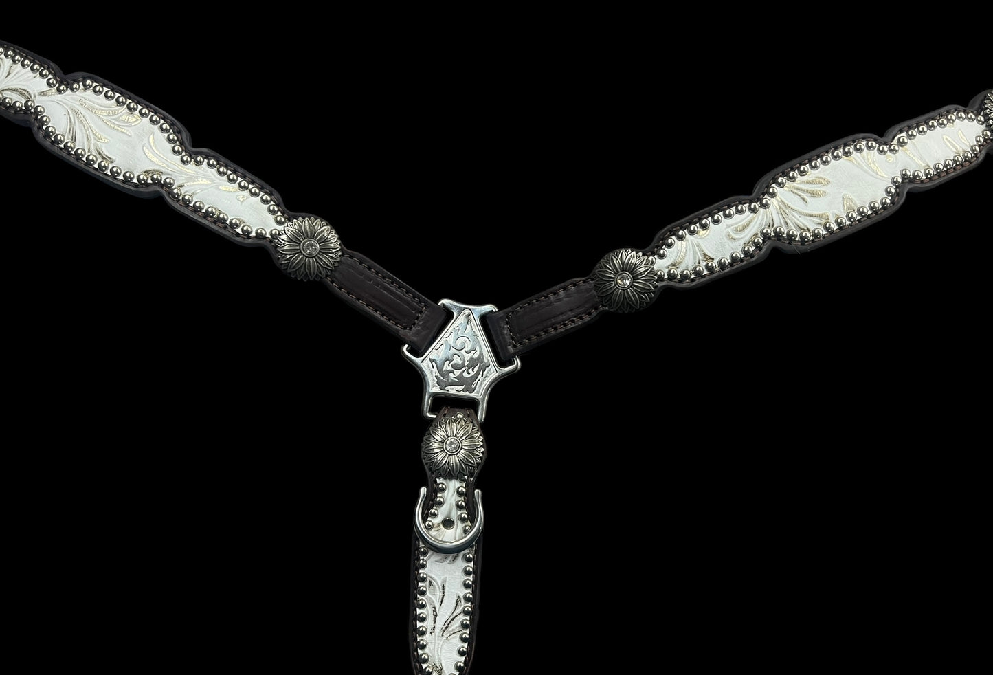 White and silver floral on dark leather