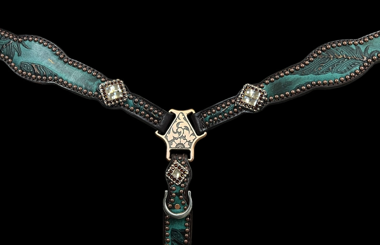 jade feathers on dark leather