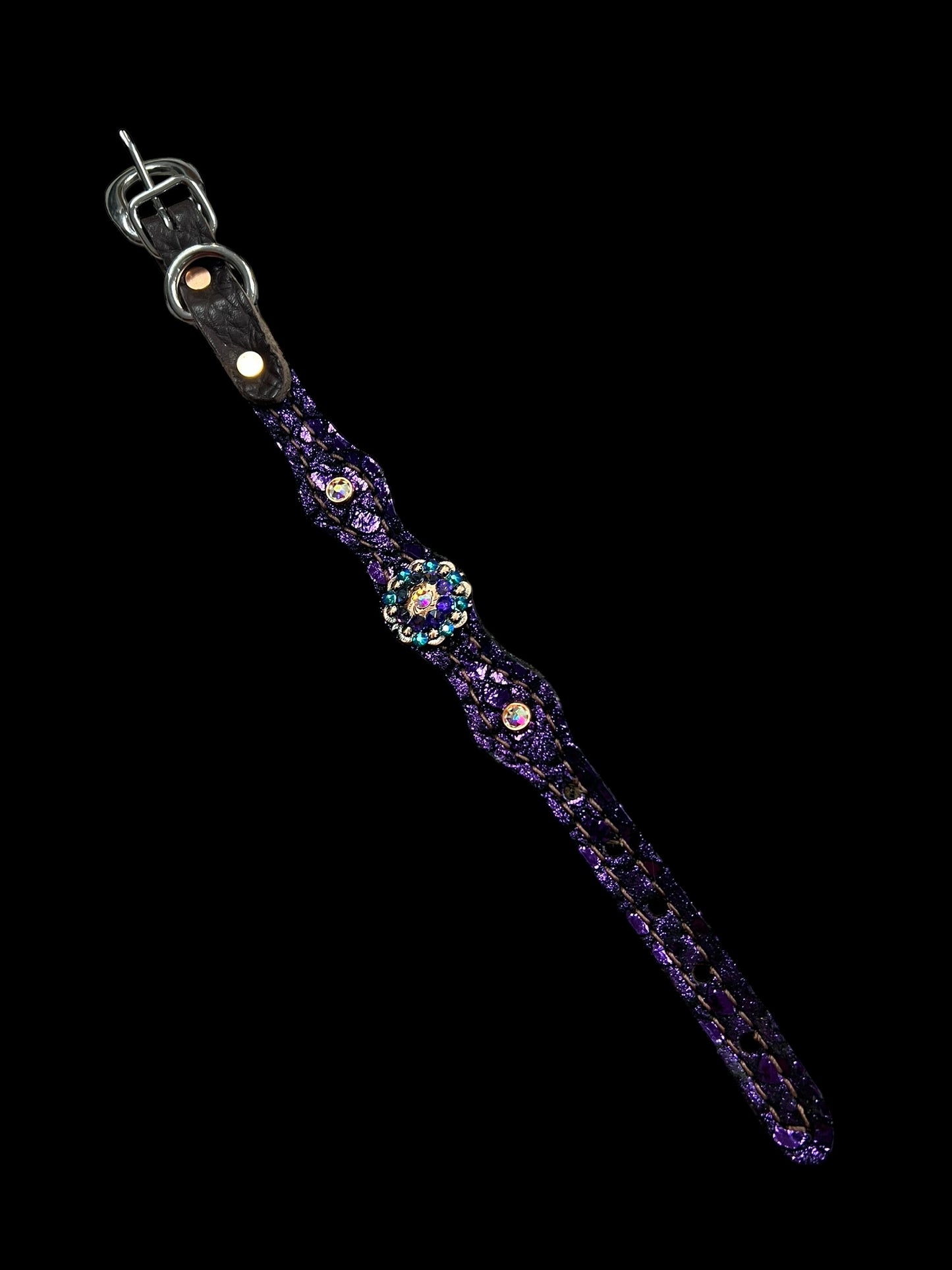 Teal and purple mystic on dark leather