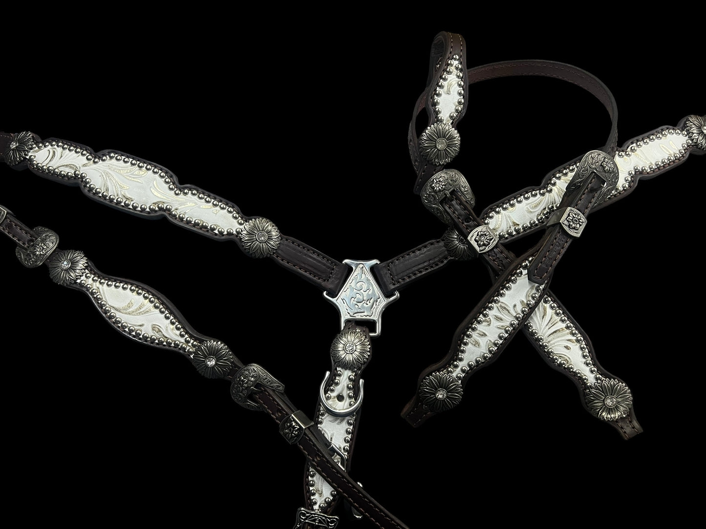 White and silver floral on dark leather