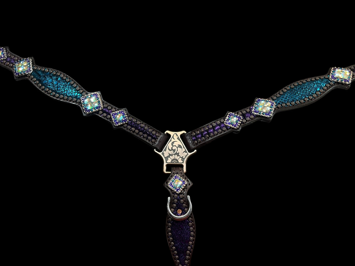 Teal and purple mystic on dark leather