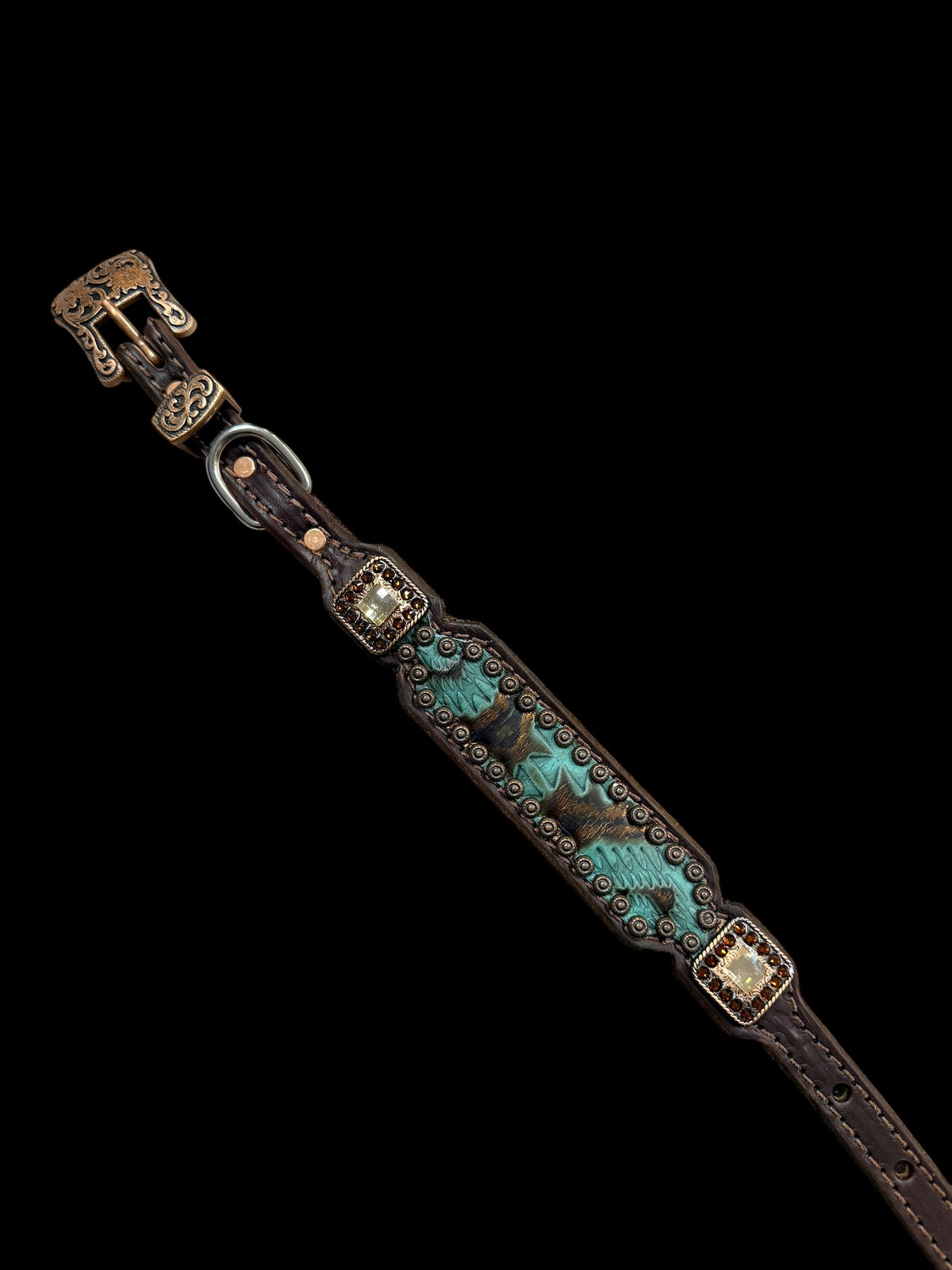 Teal and brown aztec on dark leather
