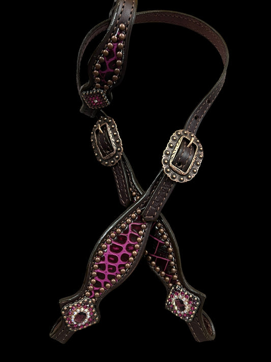 Fuchsia  gator on dark leather