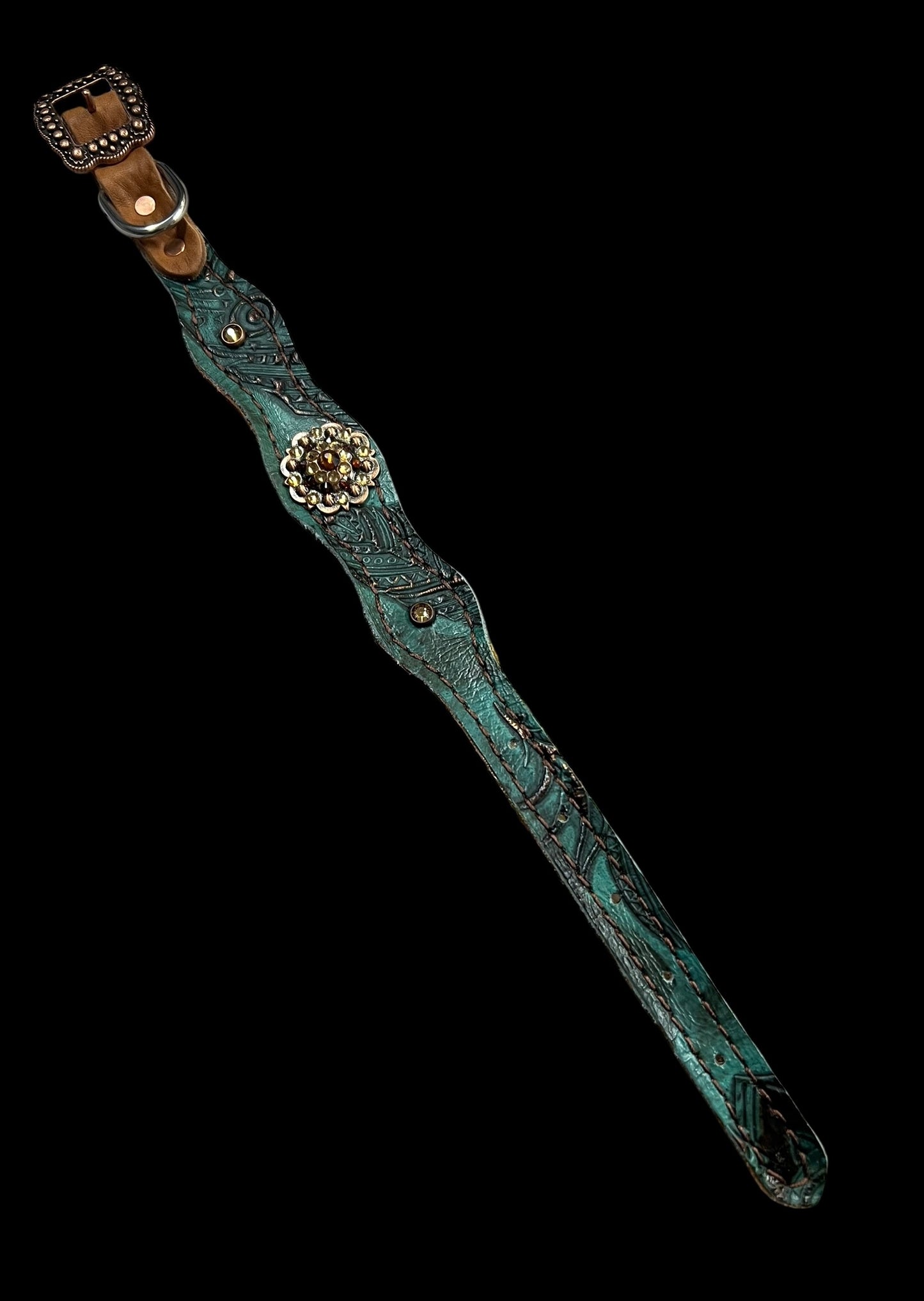 jade feathers on dark leather