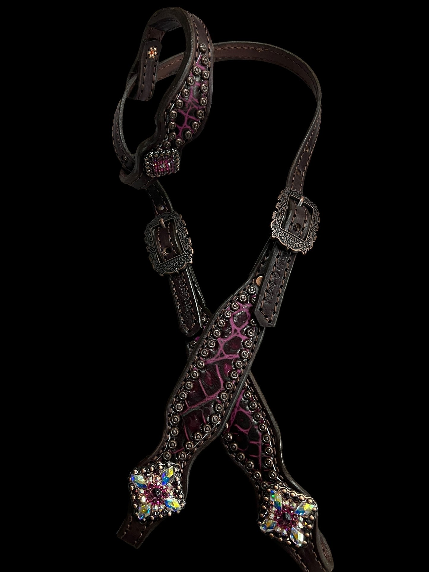 Fuchsia  gator on dark leather