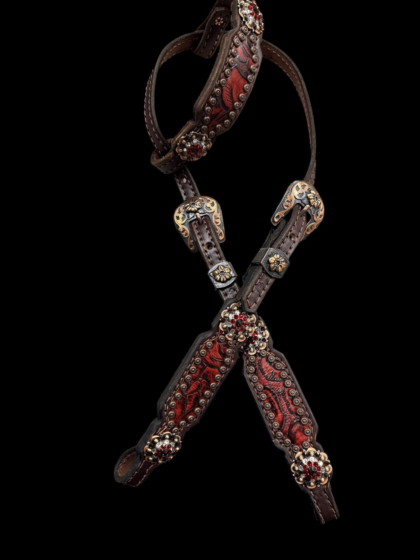 Red roses on dark leather