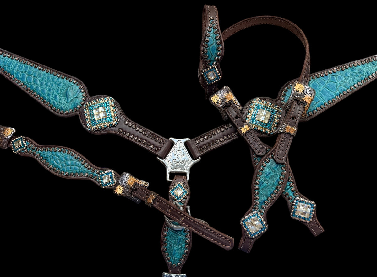 Teal gator on dark leather