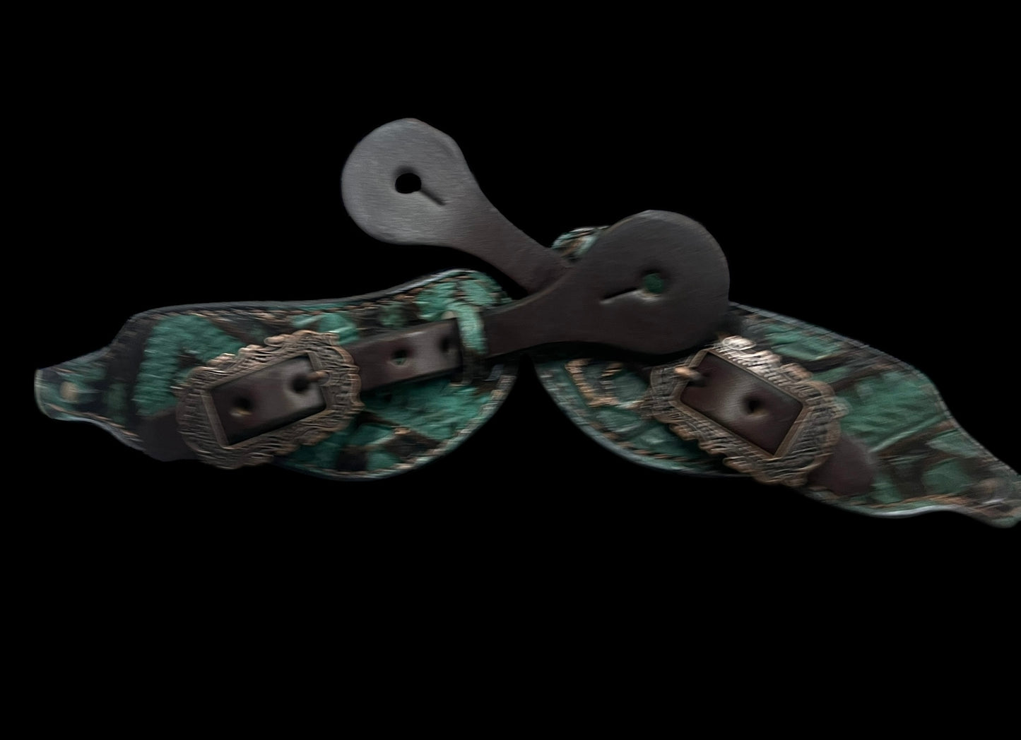 Teal and brown aztec on dark leather