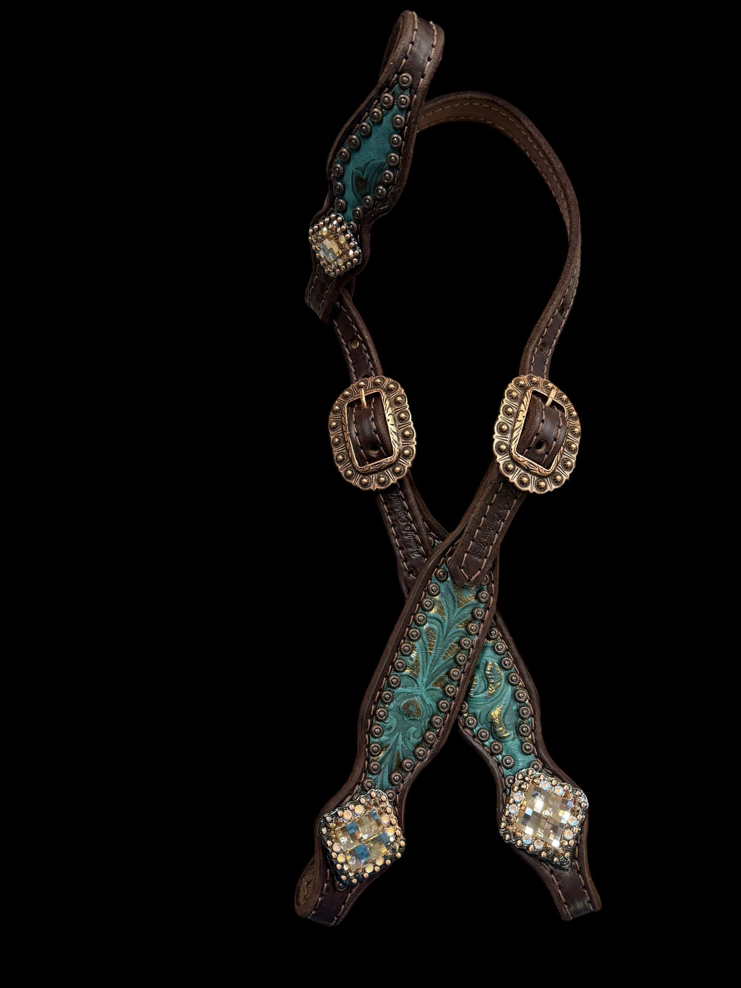 jade and copper on dark leather
