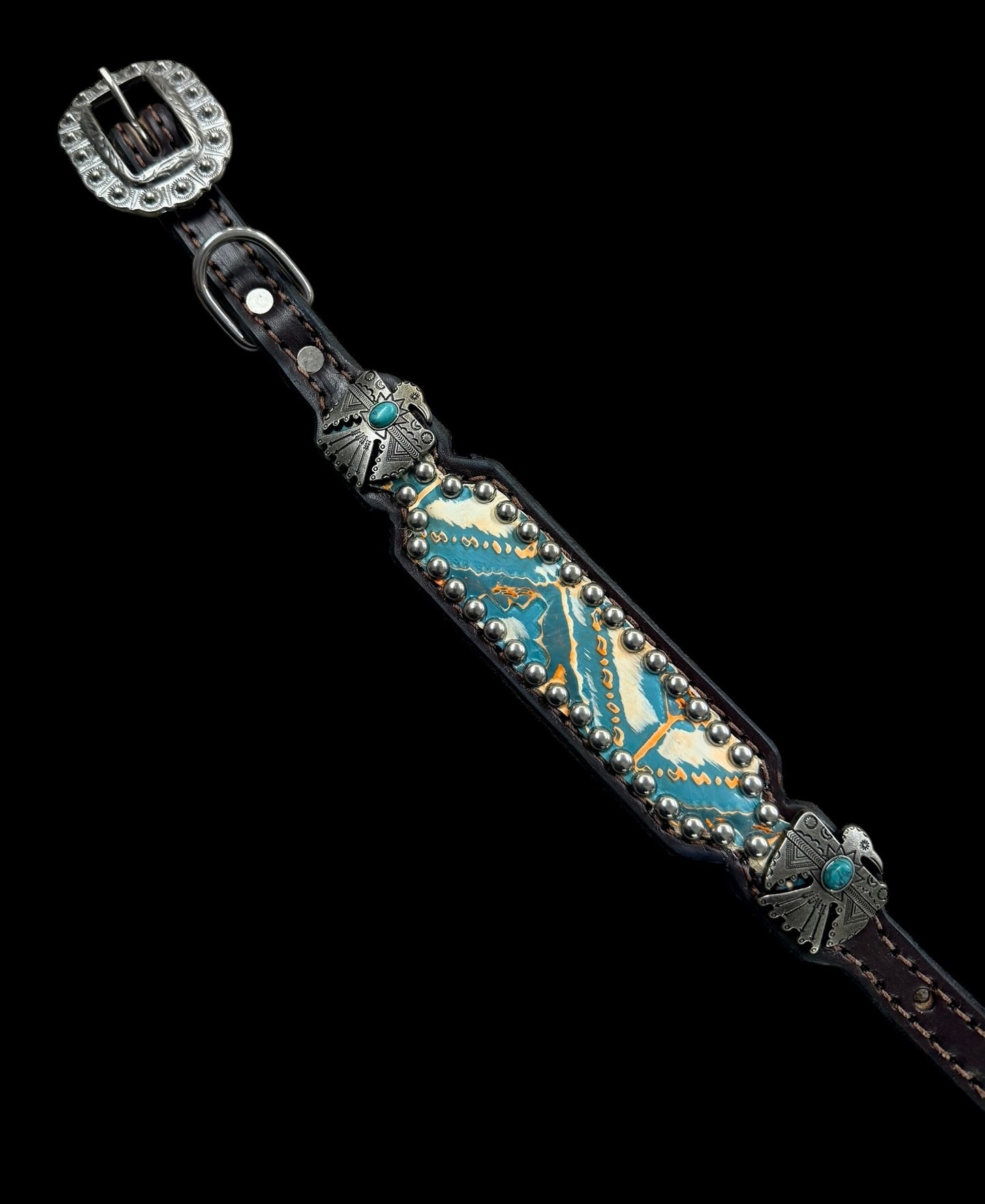 Orange and turquoise navajo on dark leather