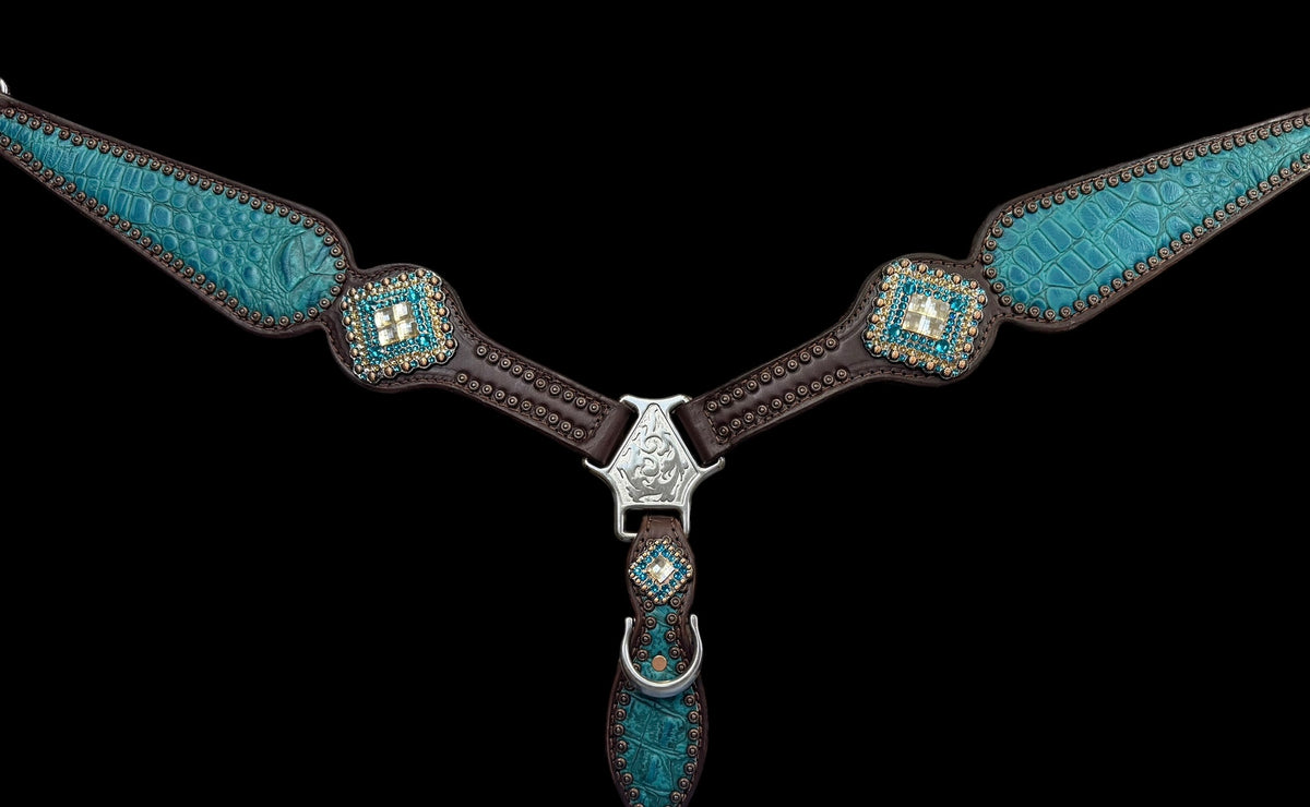 Teal gator on dark leather
