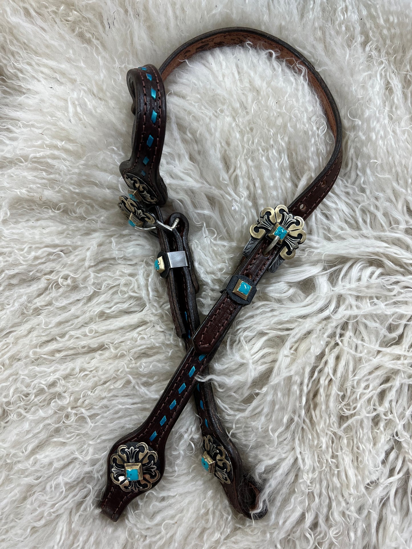 Buckstitched one ear headstall with premium conchos