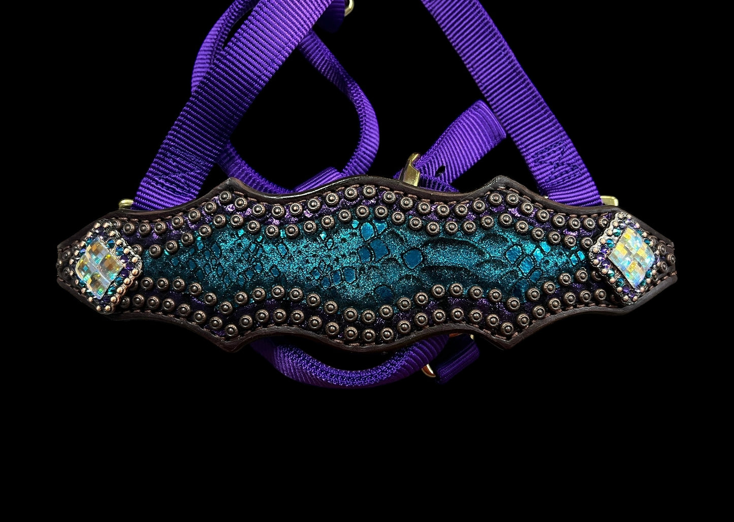 Teal and purple mystic on dark leather