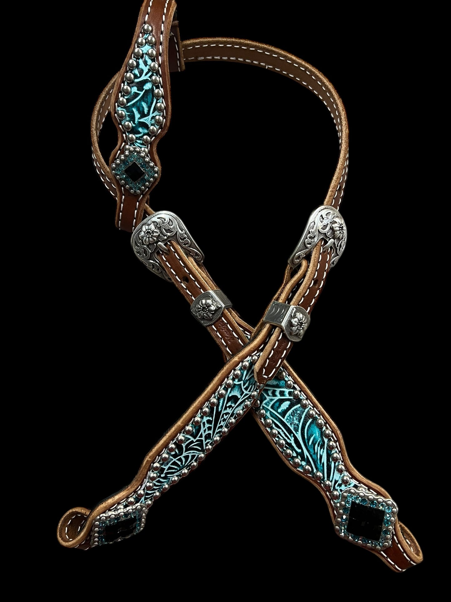 Teal and black floral on medium leather