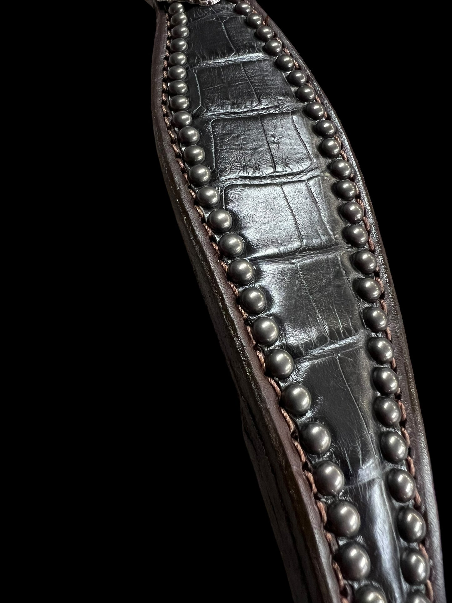 Genuine Anthracite Gator on dark leather