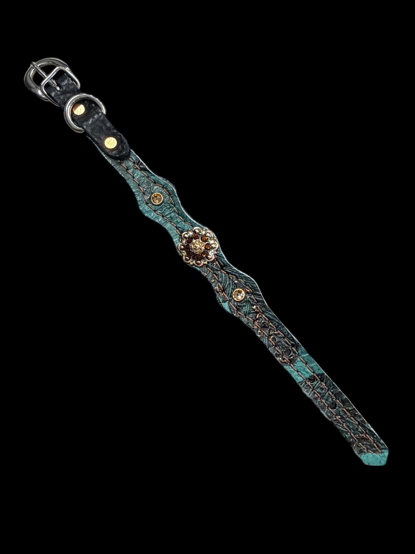 jade feathers on dark leather