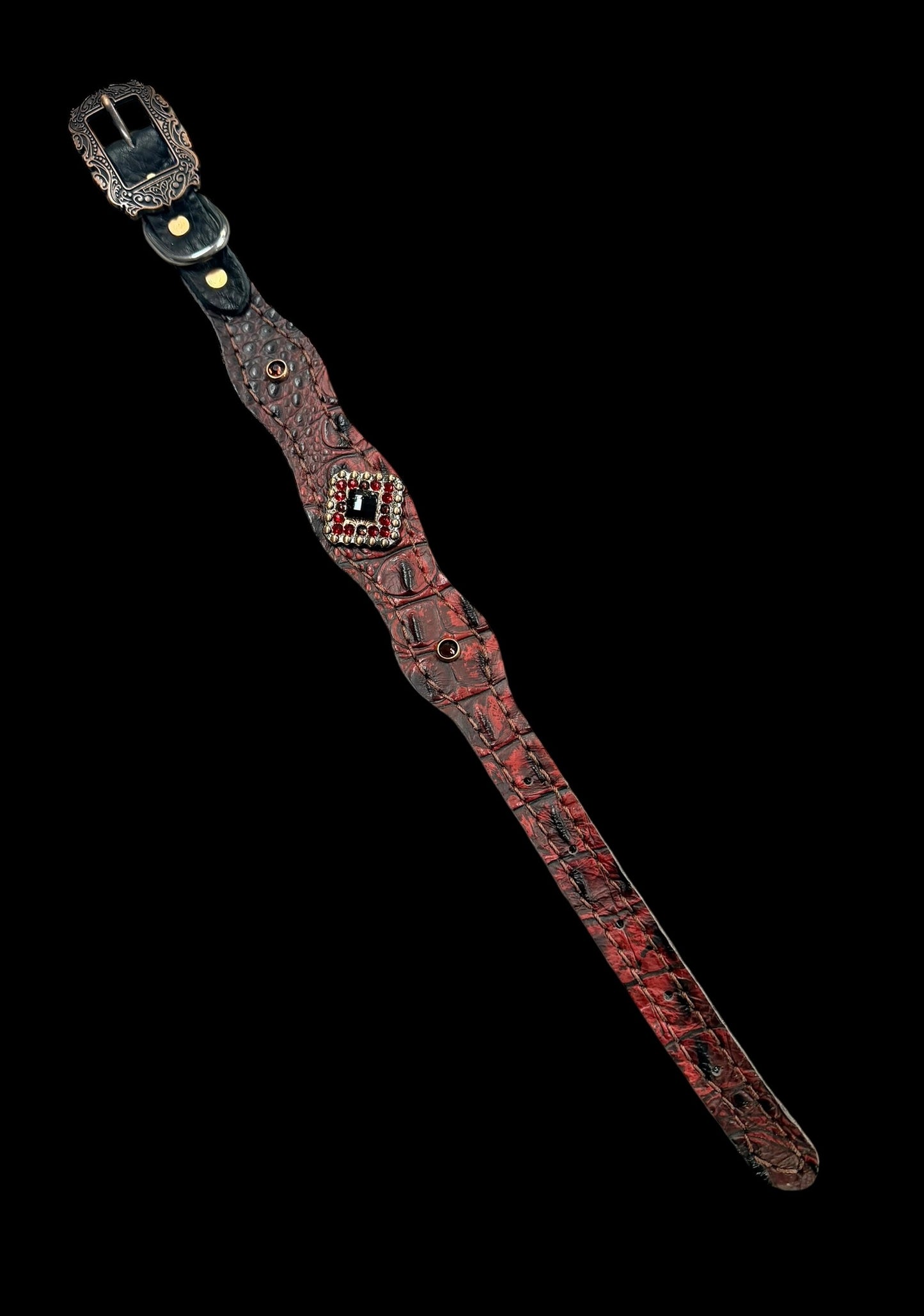 Dark red gator on dark leather