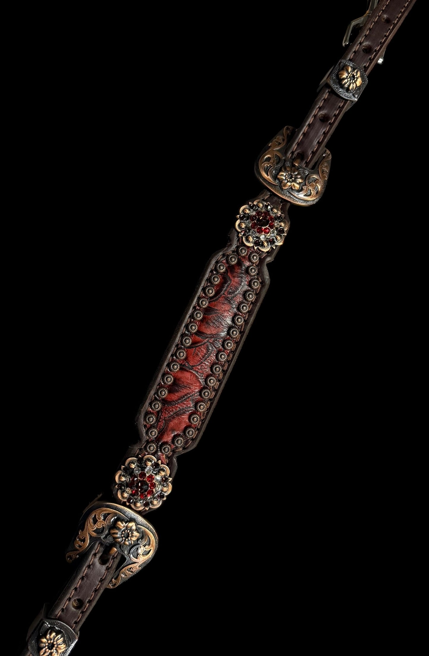 Red roses on dark leather