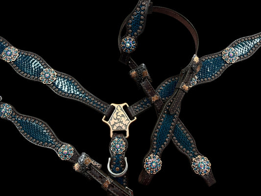 Teal snake on dark leather