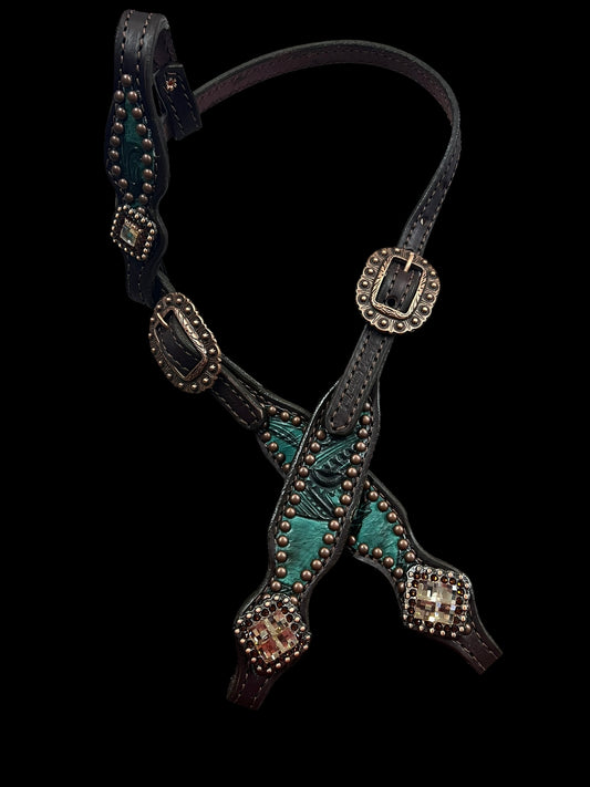 jade feathers on dark leather