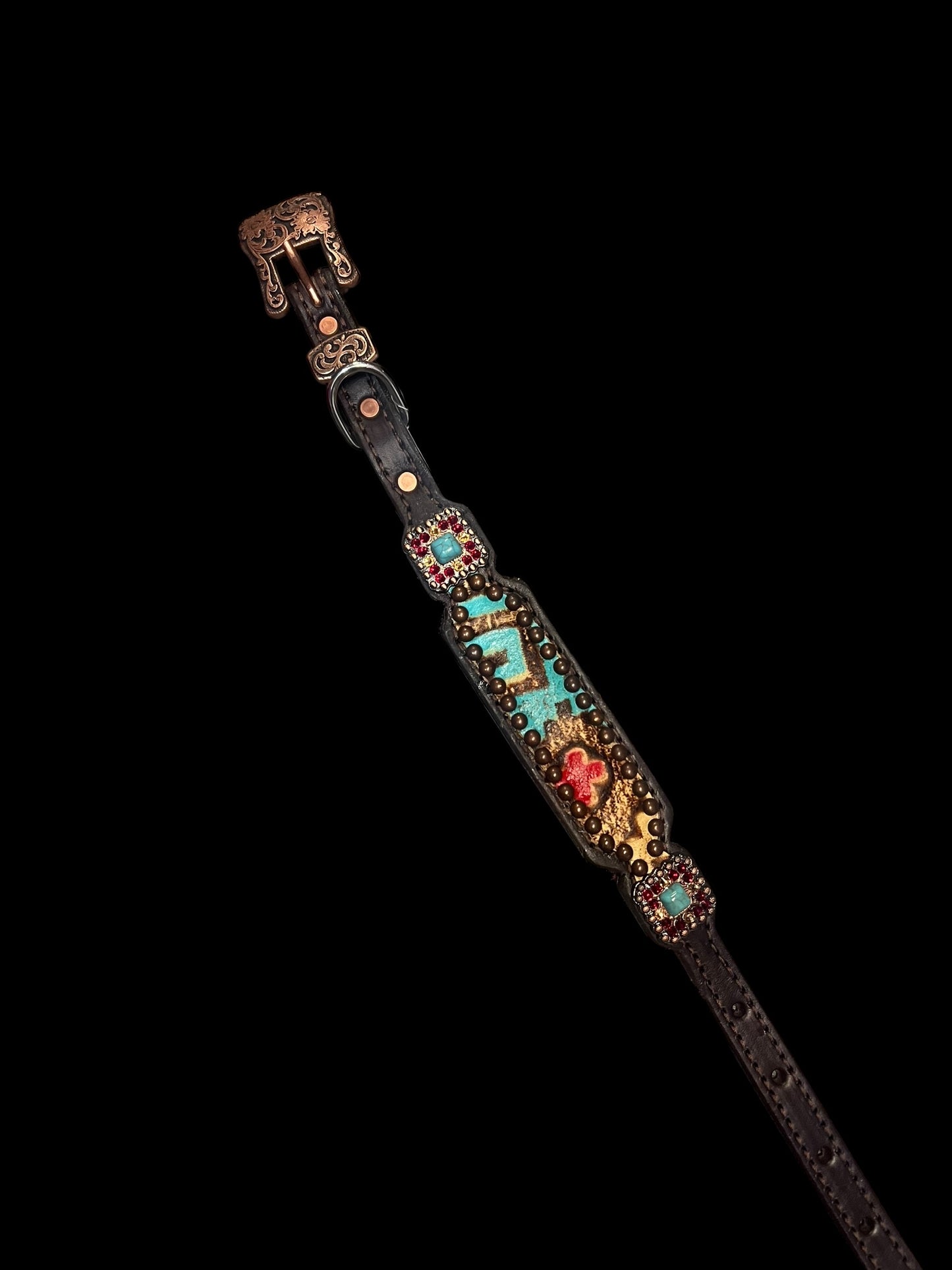 Tan, red, and turquoise Taos on dark leather