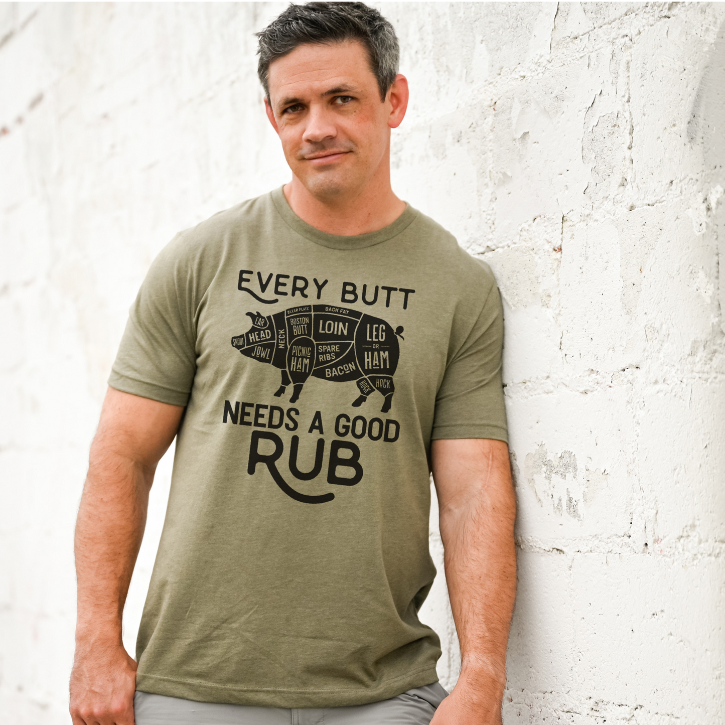 EVERY BUTT NEEDS A GOOD RUB T-SHIRT: Heather Olive Blk ink