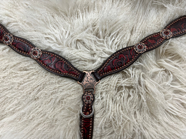 Red roses on dark leather