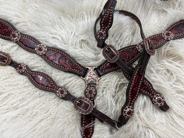 Red roses on dark leather