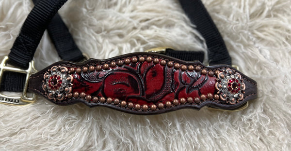 Red roses on dark leather