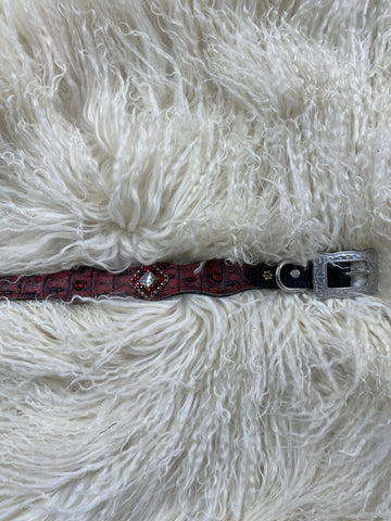 Dark red gator on dark leather